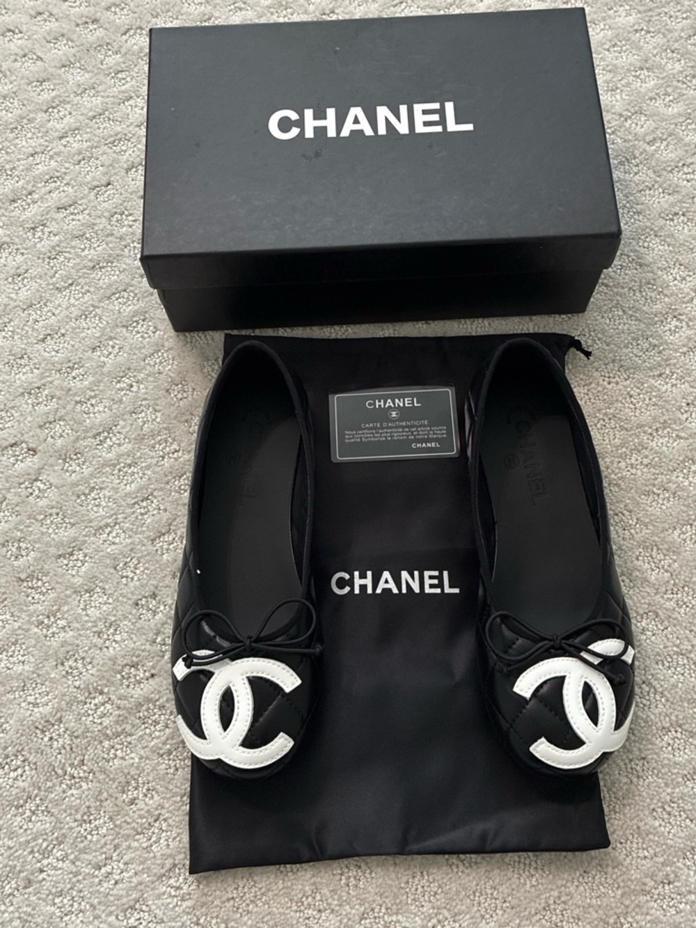 CHANEL Black Quilted Leather Men’s Loafers with Red Sole Accent